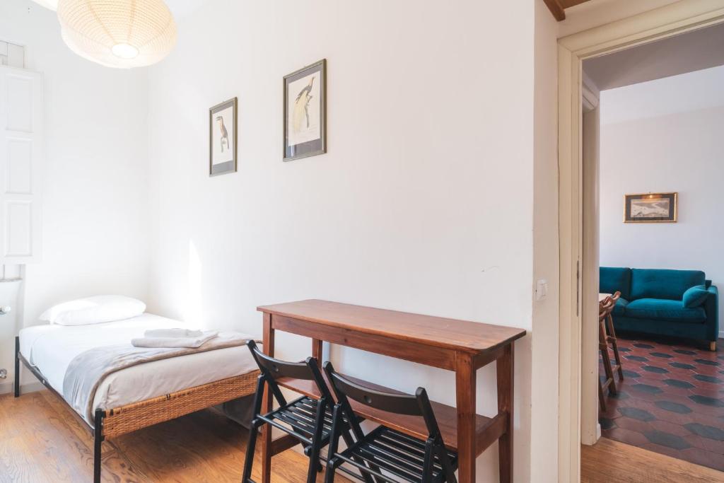 Posteľ alebo postele v izbe v ubytovaní HC - Sunny Apartment in Testaccio!