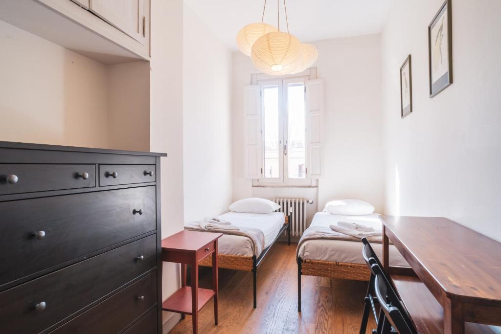 Posteľ alebo postele v izbe v ubytovaní HC - Sunny Apartment in Testaccio!