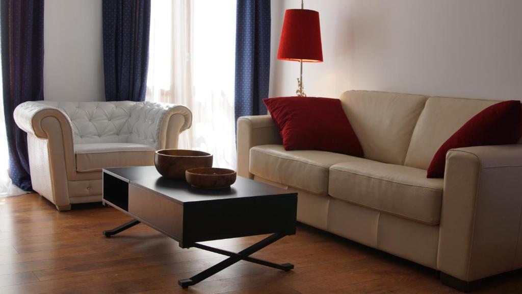 a living room with a couch and a table at La Bohemia Casco Antiguo 2 in Denia