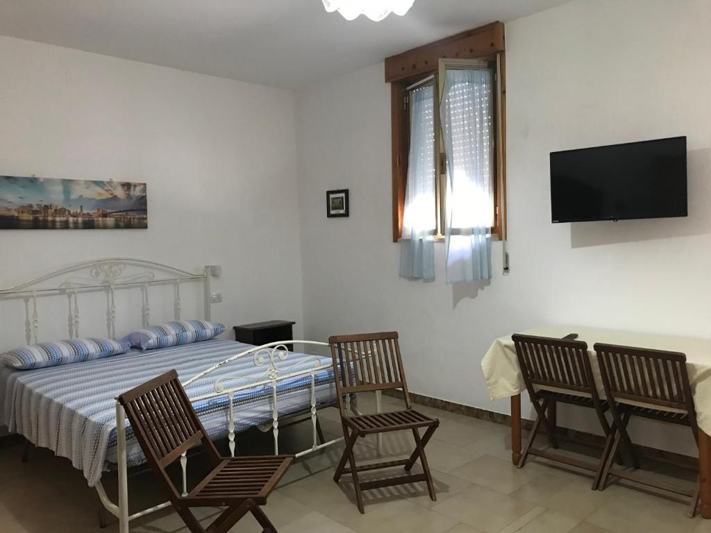 TV a/nebo společenská místnost v ubytování Albergo Europa