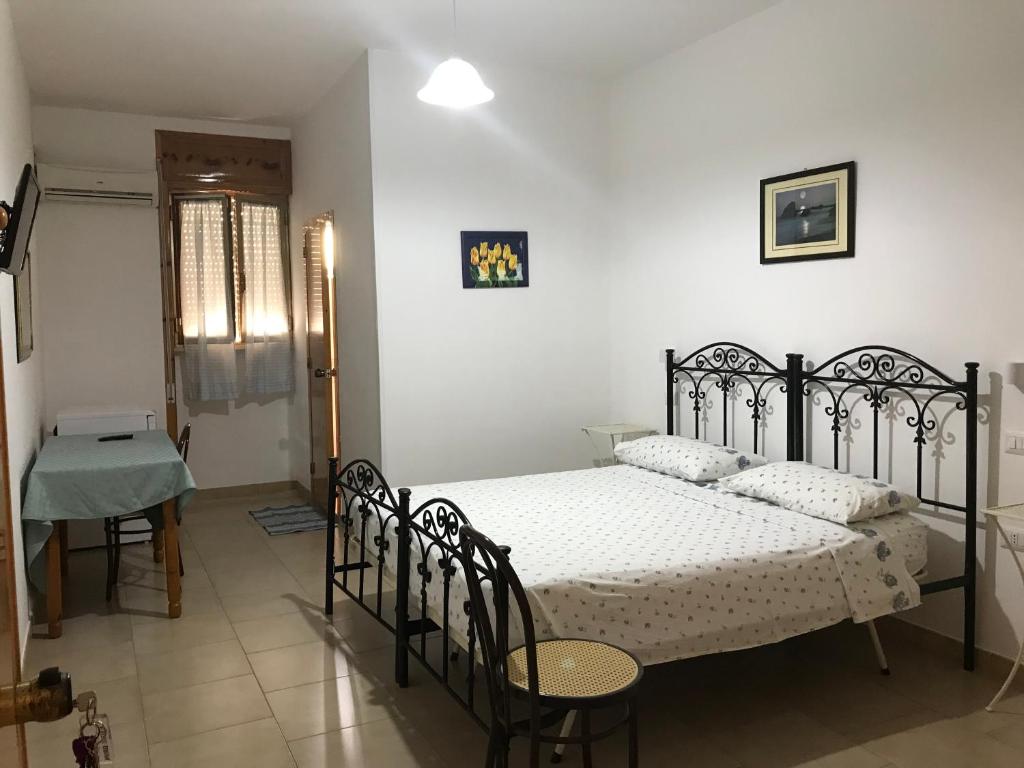 Postel nebo postele na pokoji v ubytování Albergo Europa