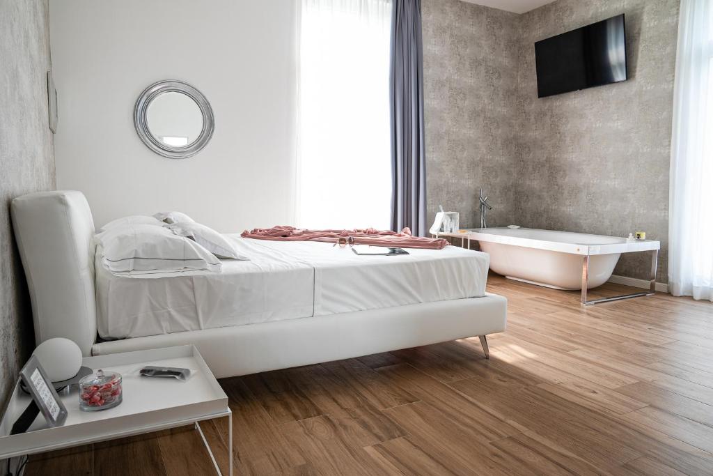 Letto o letti in una camera di Villa Tosati