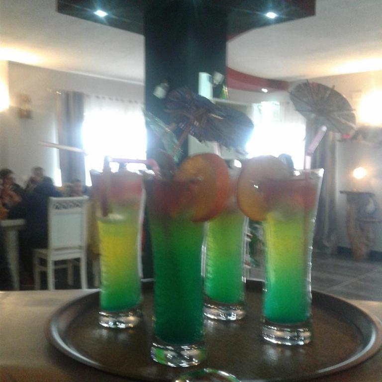 Nápoje v ubytování Hotel Villa Stone Dream Bar Restaurant