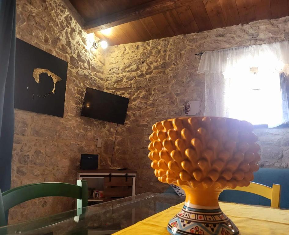 TV a/nebo společenská místnost v ubytování Ai cento scalini