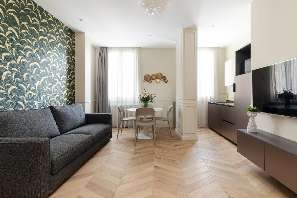 Telewizja i/lub zestaw kina domowego w obiekcie Casa Duomo Luxury Suites