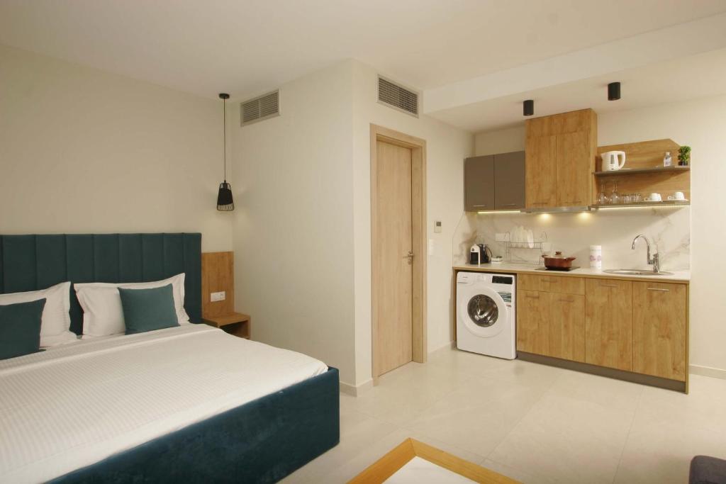 Kuchyň nebo kuchyňský kout v ubytování Oliva Suites