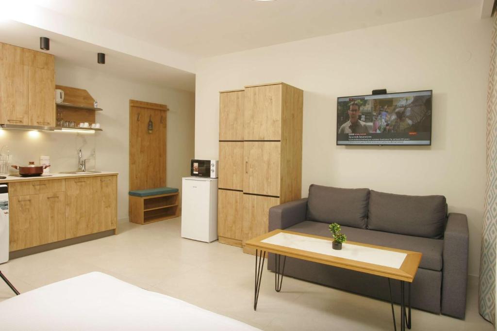 Kuchyň nebo kuchyňský kout v ubytování Oliva Suites