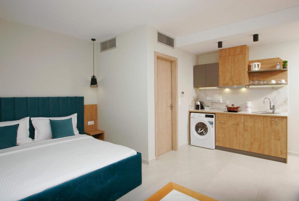 Kuchyň nebo kuchyňský kout v ubytování Oliva Suites