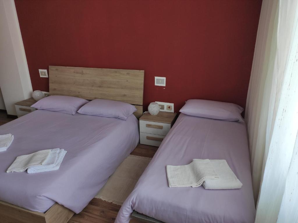 Postel nebo postele na pokoji v ubytování Albergo Al Trieste