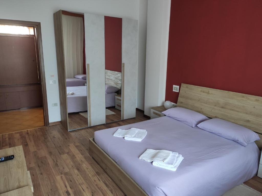 Postel nebo postele na pokoji v ubytování Albergo Al Trieste