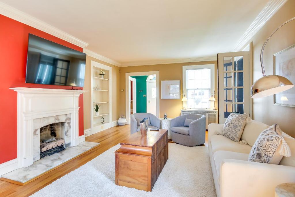 a living room with a couch and a fireplace at Augusta Vacation Rental about 5 Mi to Downtown in Augusta