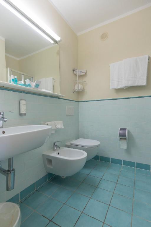 Koupelna v ubytování Hotel Fabricia