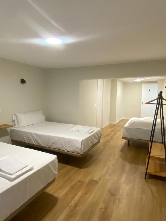 Letto o letti in una camera di Hostal Mindanao