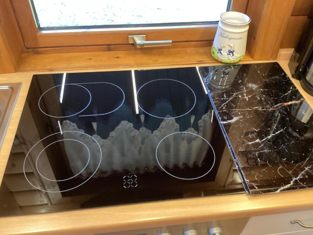 Kuchyň nebo kuchyňský kout v ubytování Chalet Spessart