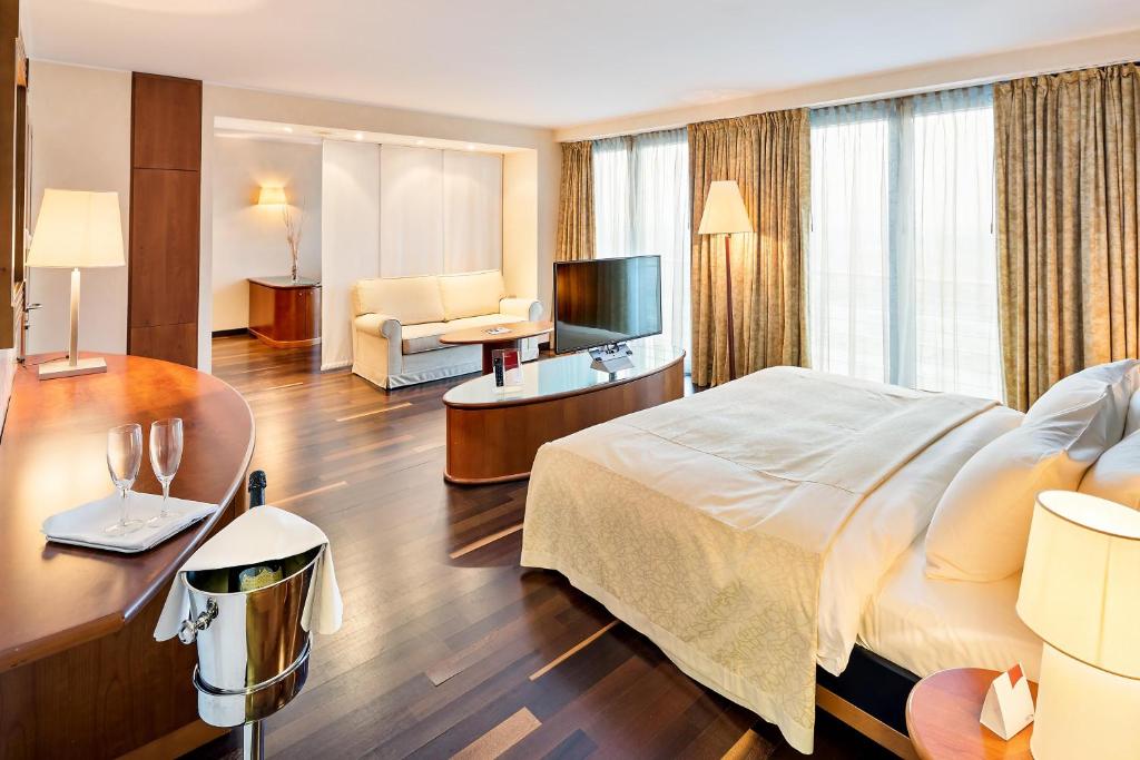 Ένα ή περισσότερα κρεβάτια σε δωμάτιο στο Austria Trend Hotel Ljubljana