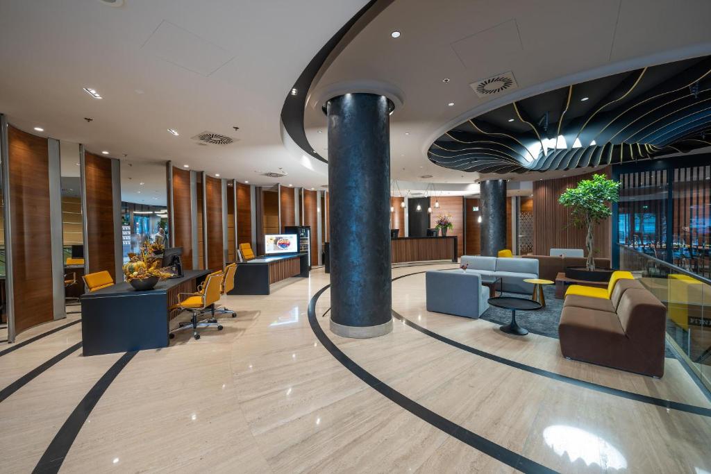 Χώρος καθιστικού στο Austria Trend Hotel Ljubljana