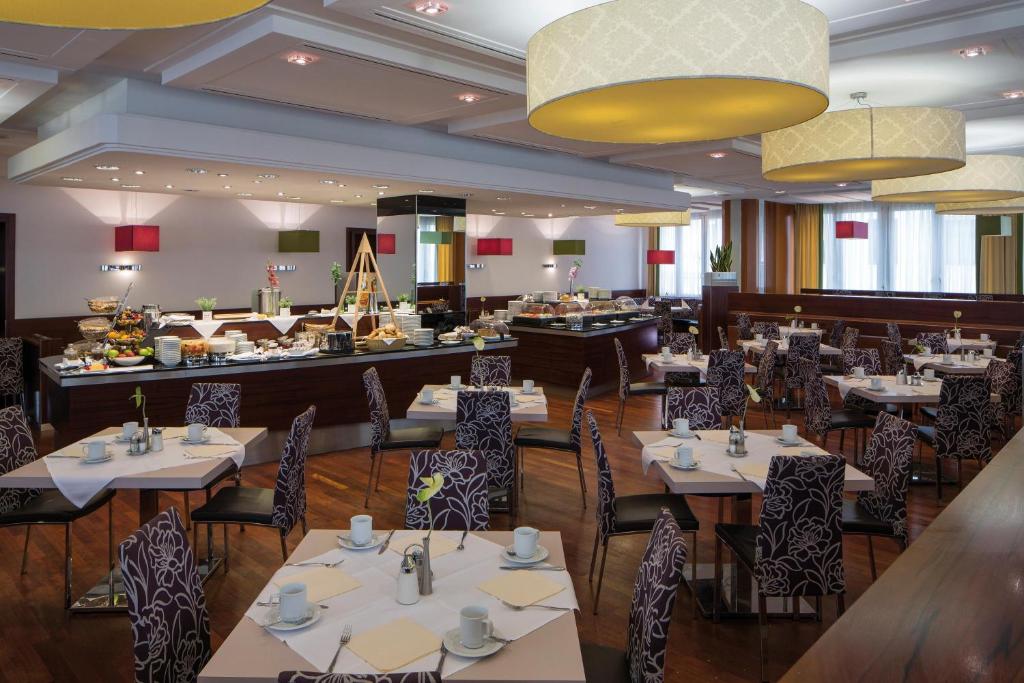 Un restaurante u otro lugar para comer en Austria Trend Hotel Europa Graz Hauptbahnhof
