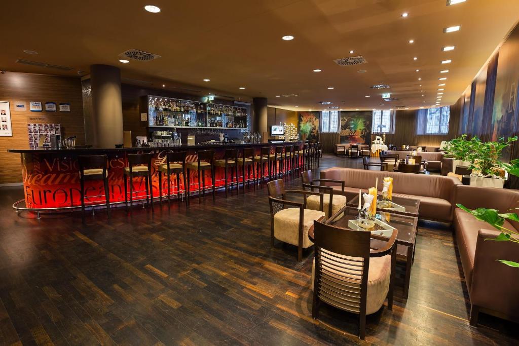 Austria Trend Hotel Savoyen Vienna - 4 stars superiorにあるレストランまたは飲食店