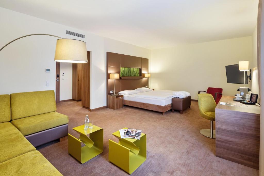 Postel nebo postele na pokoji v ubytování Austria Trend Hotel Doppio Wien