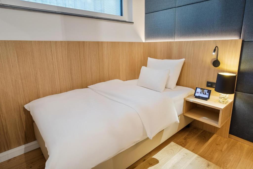 Austria Trend Hotel Maximilian房間的床