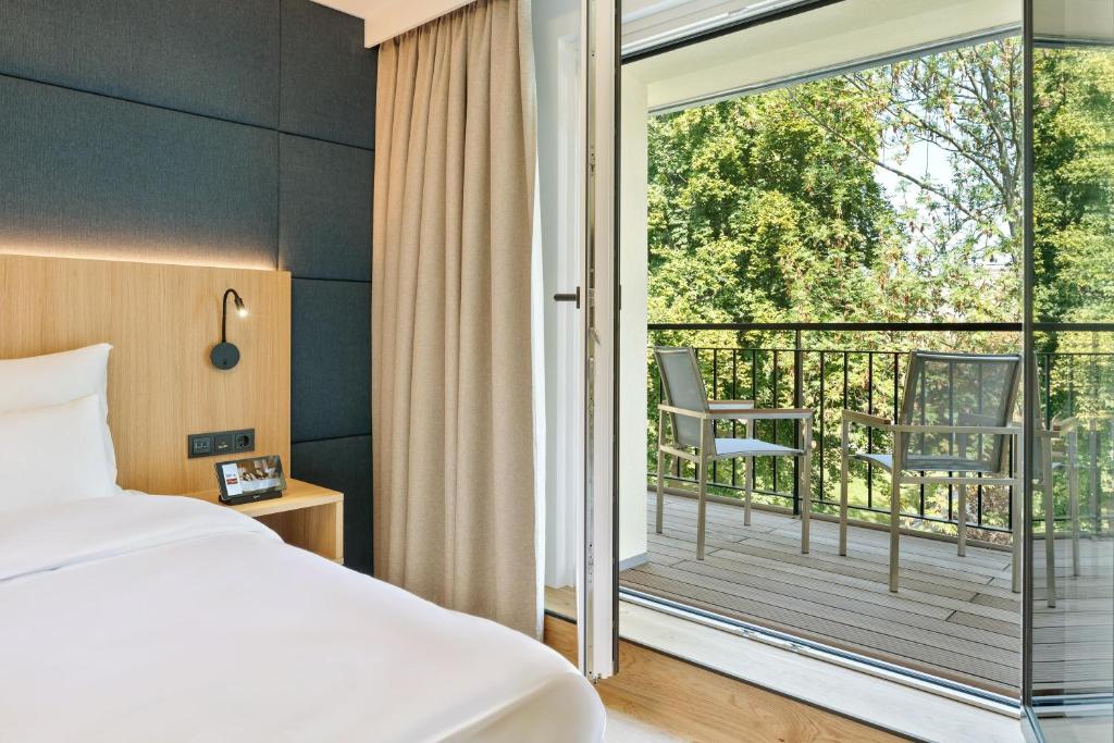 Austria Trend Hotel Maximilian房間的床