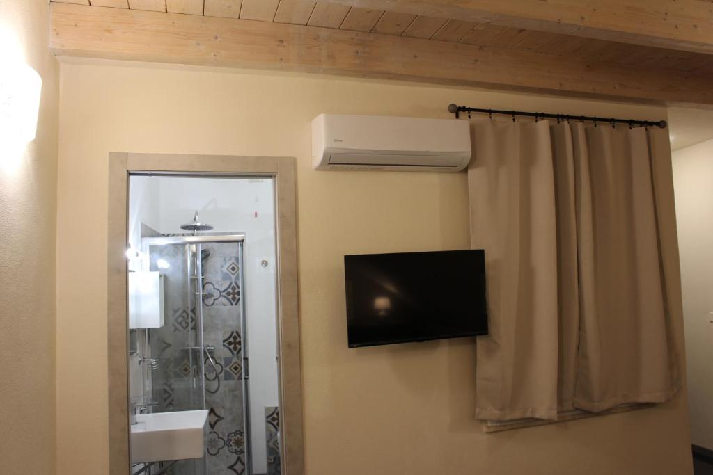 Koupelna v ubytování Via Cavour 19, Camere del Conte
