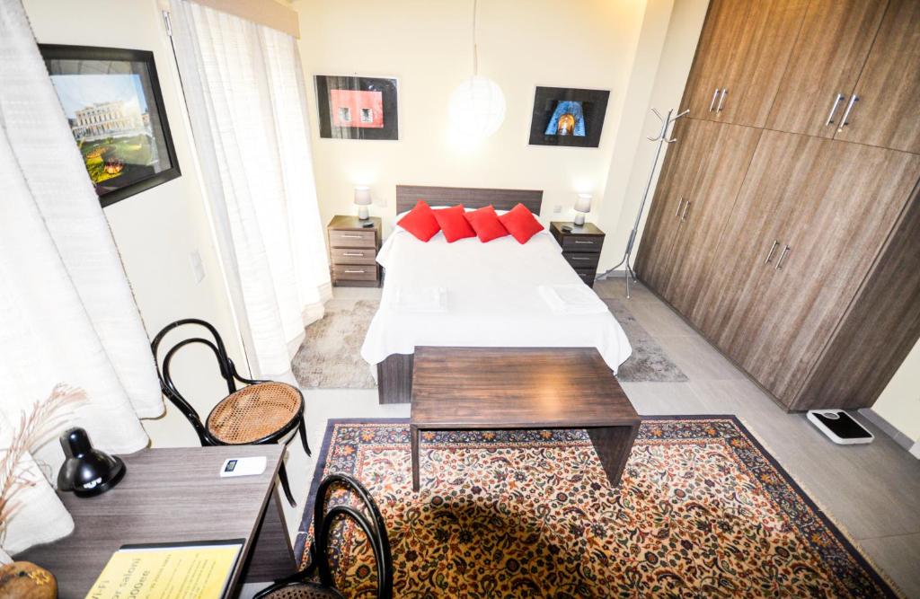 Postel nebo postele na pokoji v ubytování B&B in Corfu Town