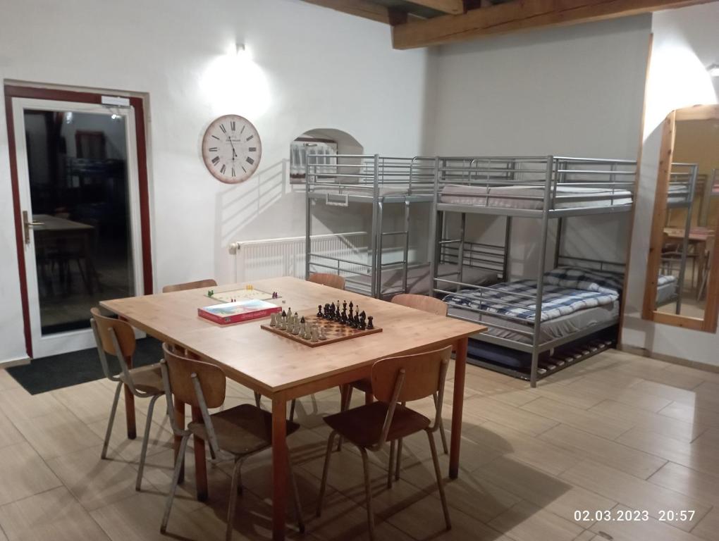 Postel nebo postele na pokoji v ubytování Chalupa-statek Arkáda