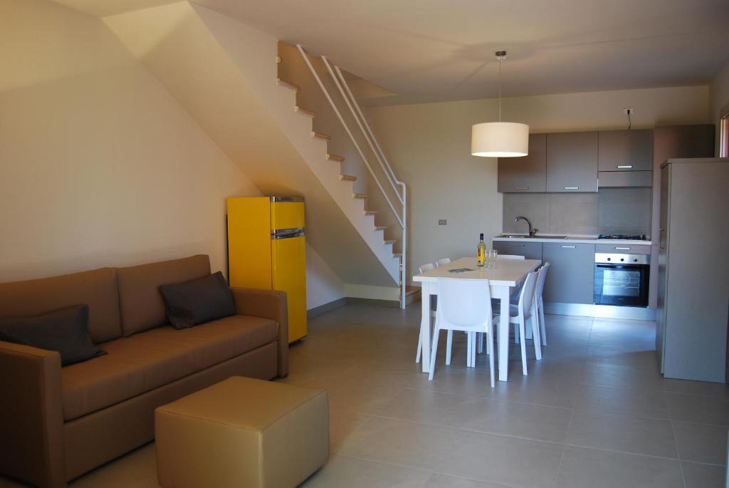 Kuchyňa alebo kuchynka v ubytovaní Residenze Al Colle Dei Pini