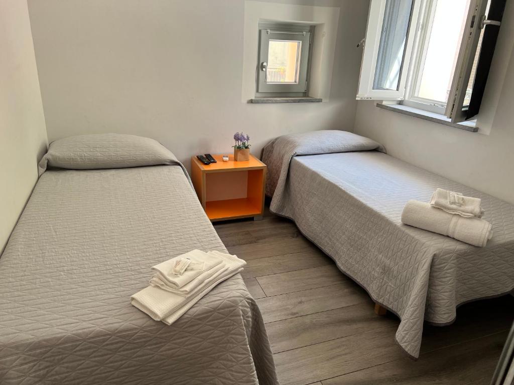 Postel nebo postele na pokoji v ubytování B&B La Torre