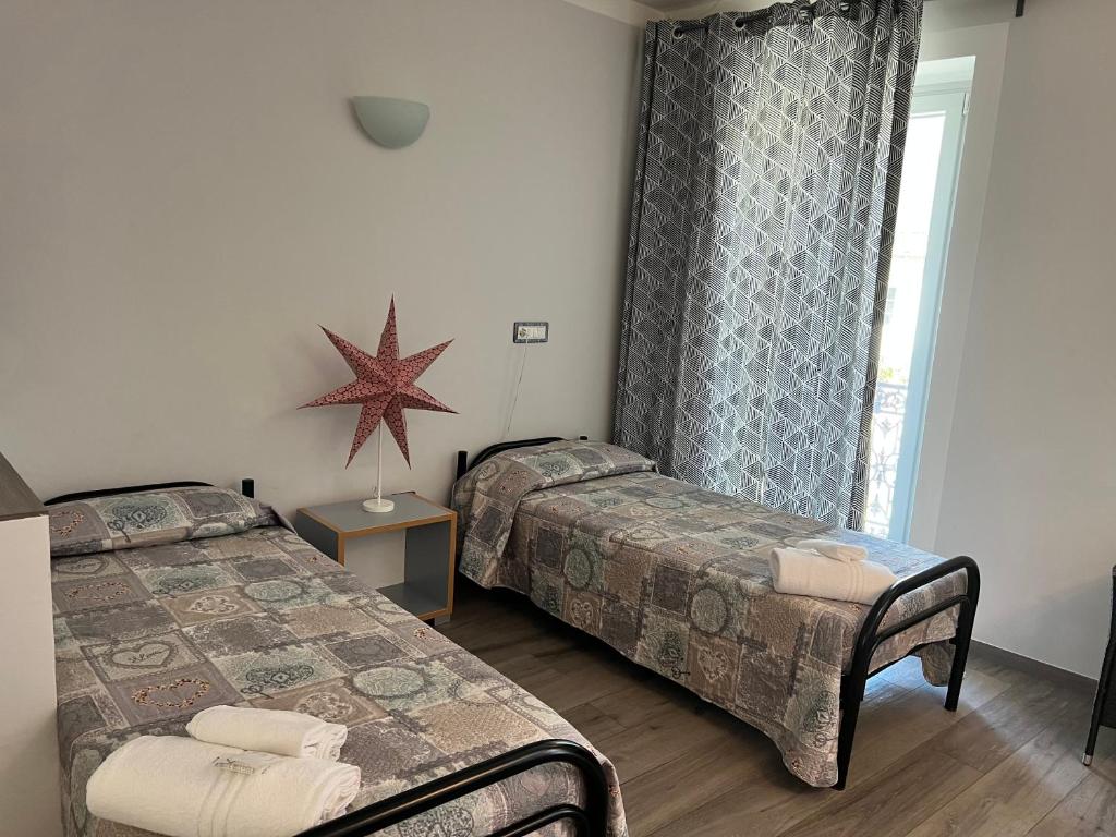 Postel nebo postele na pokoji v ubytování B&B La Torre