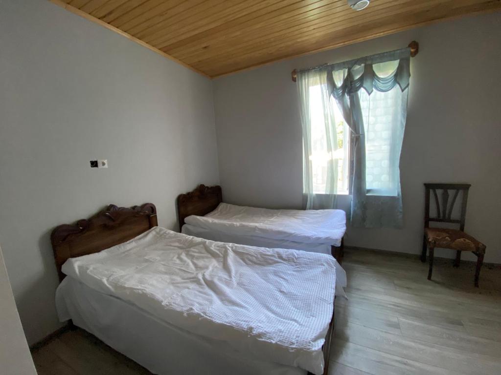 Postel nebo postele na pokoji v ubytování Aquarius