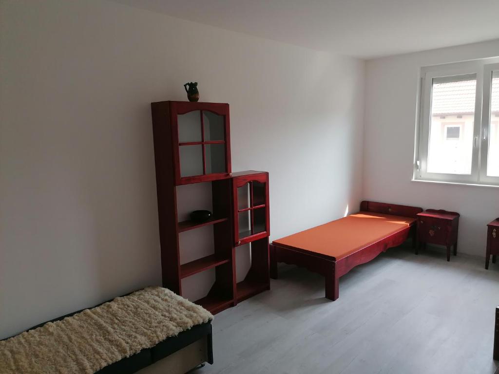 Postel nebo postele na pokoji v ubytování Borács Winedégház