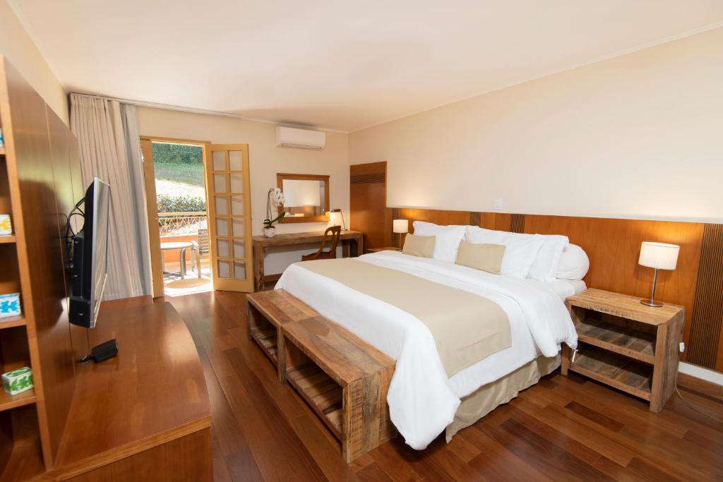 Postel nebo postele na pokoji v ubytování Hotel Villa Rossa