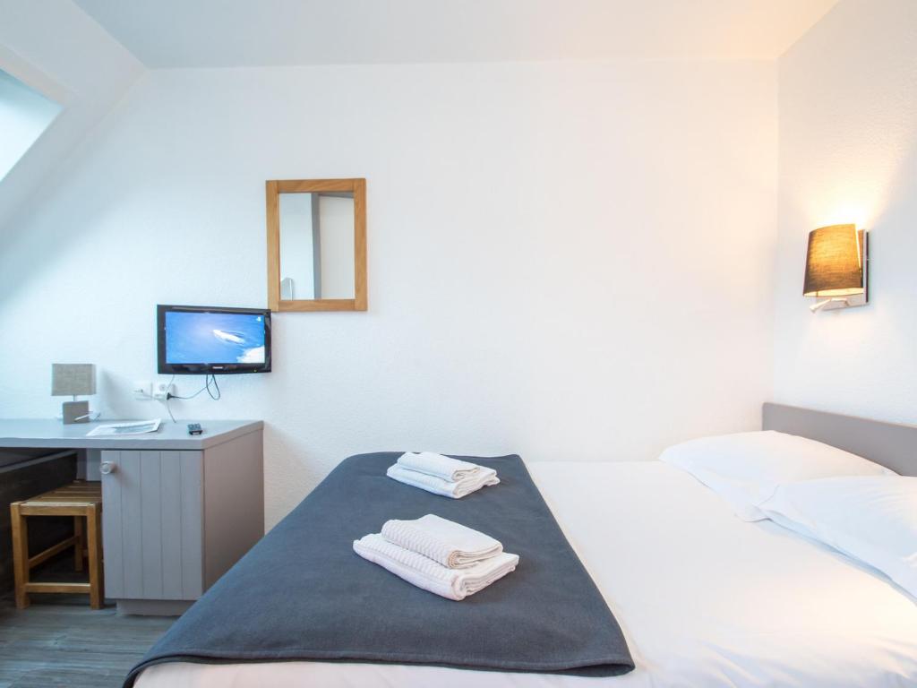 Posteľ alebo postele v izbe v ubytovaní Appartement rénové avec parking et wifi à Chamonix - FR-1-343-208