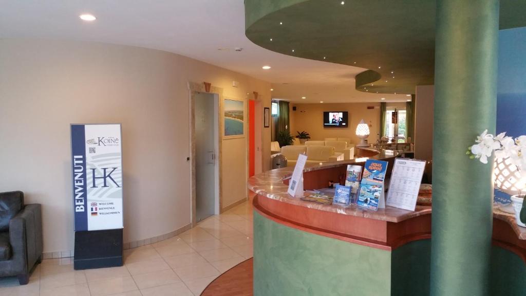 TV a/nebo společenská místnost v ubytování Hotel Club Koiné