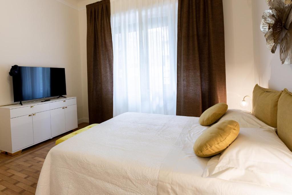 Postel nebo postele na pokoji v ubytování Maison d'Or