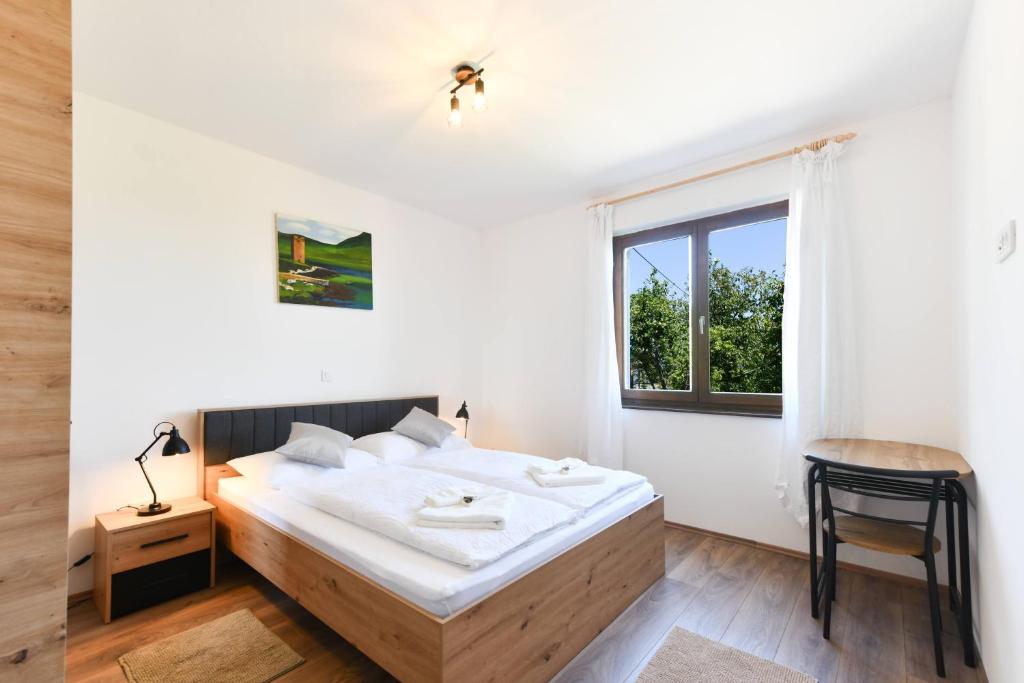 Postel nebo postele na pokoji v ubytování Wildernest Holiday Home