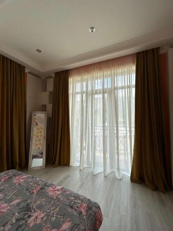 Postel nebo postele na pokoji v ubytování Orophile guest house