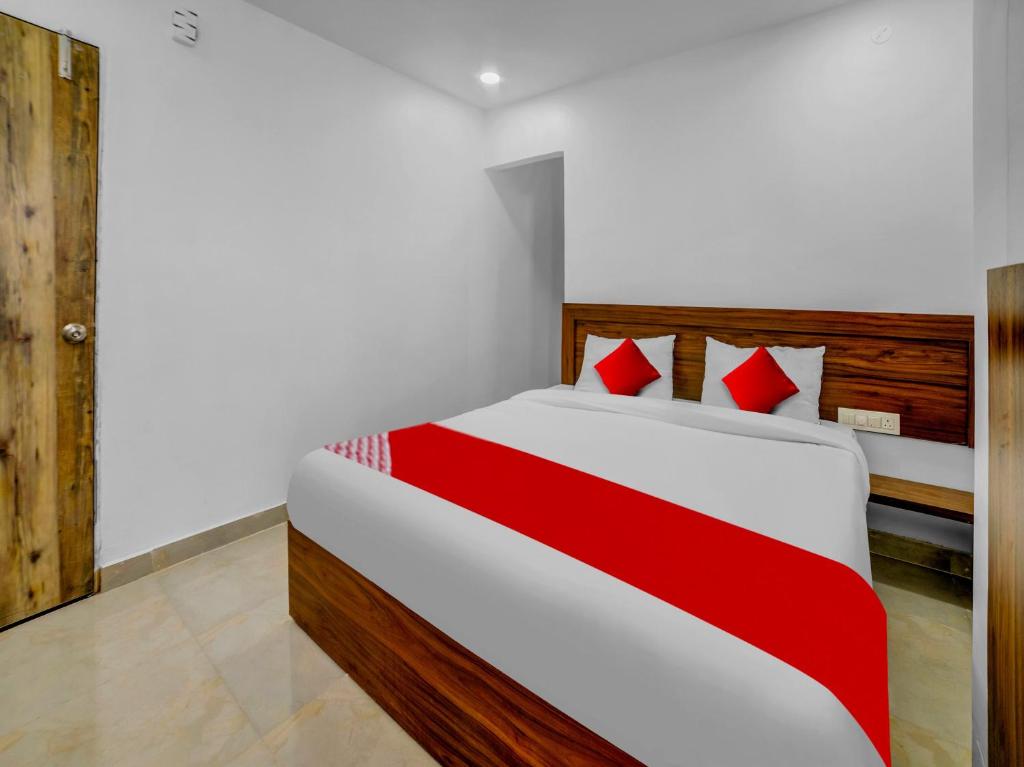 Postelja oz. postelje v sobi nastanitve OYO Flagship 81293 Hotel As Residency