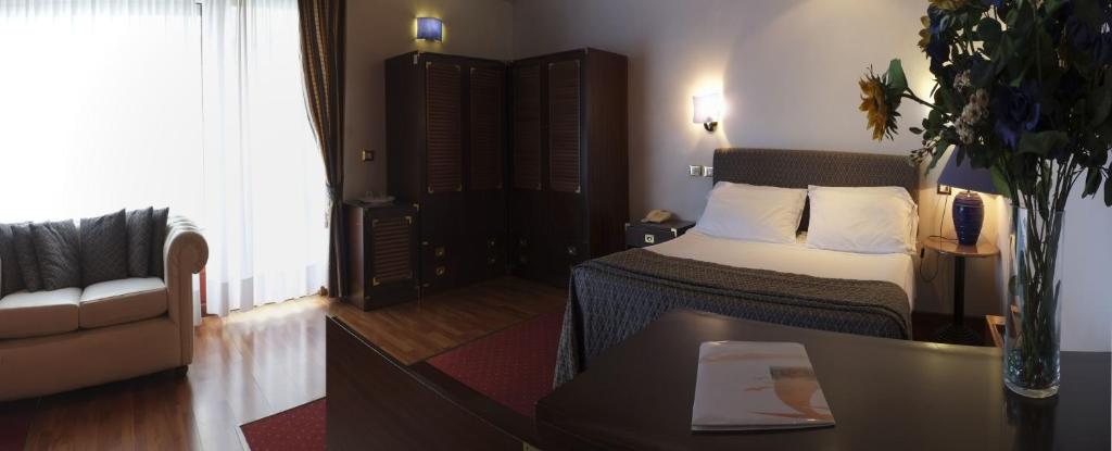 Postel nebo postele na pokoji v ubytování Hotel Soraya