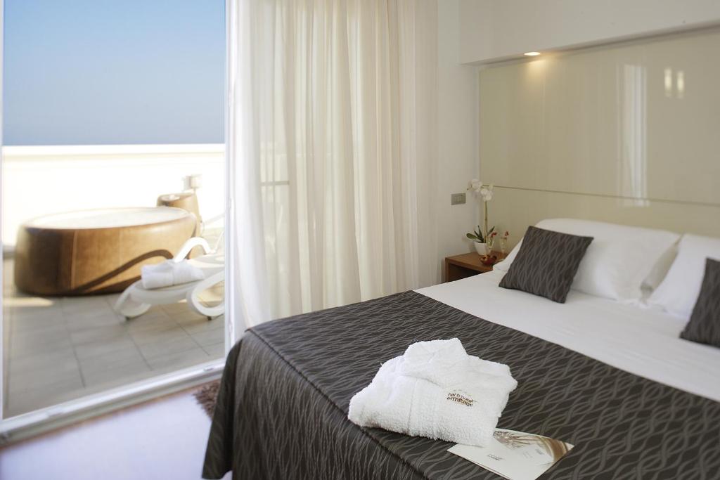 Posteľ alebo postele v izbe v ubytovaní Park Hotel Ermitage Resort & Spa