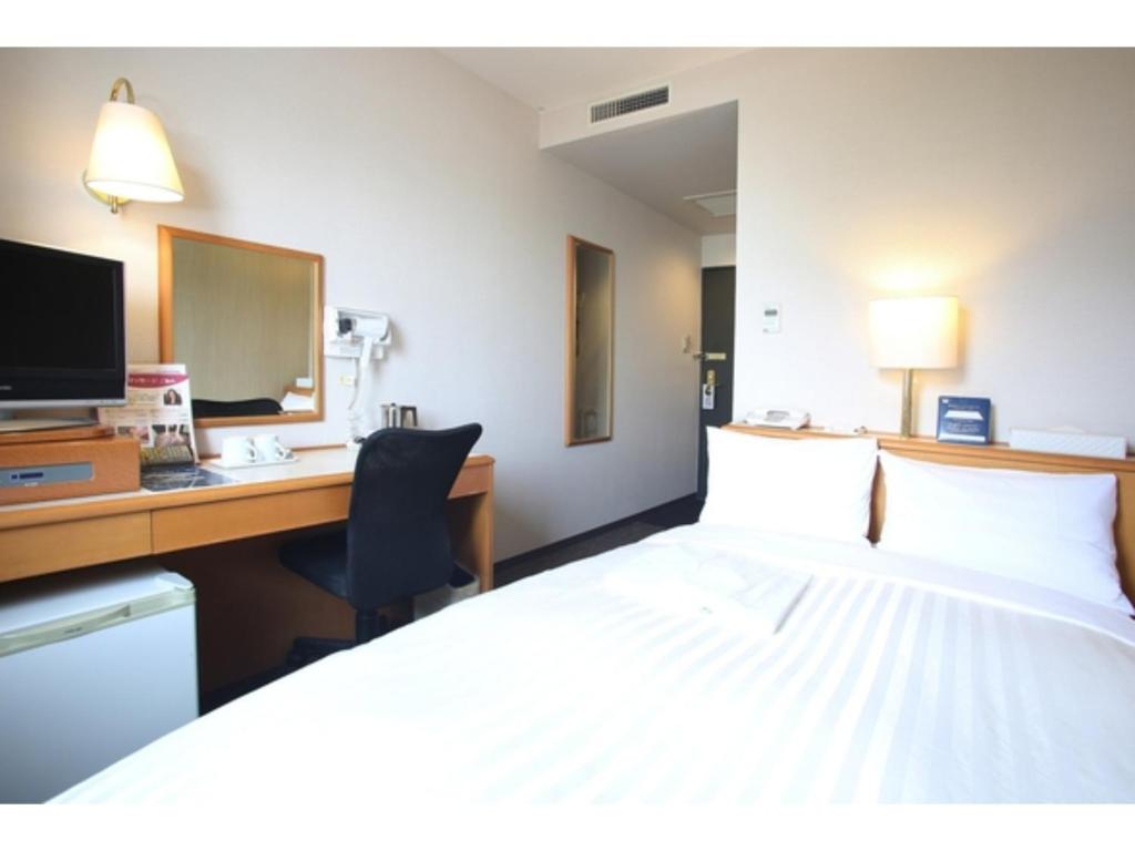 Voodi või voodid majutusasutuse Sun Hotel Tosu Saga - Vacation STAY 49476v toas