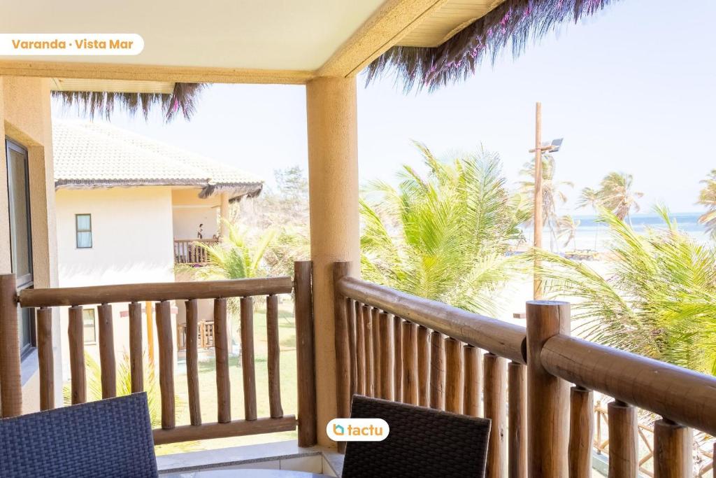 Un balcon sau o terasă la Bangalô vista mar VG Sun Cumbuco por Tactu