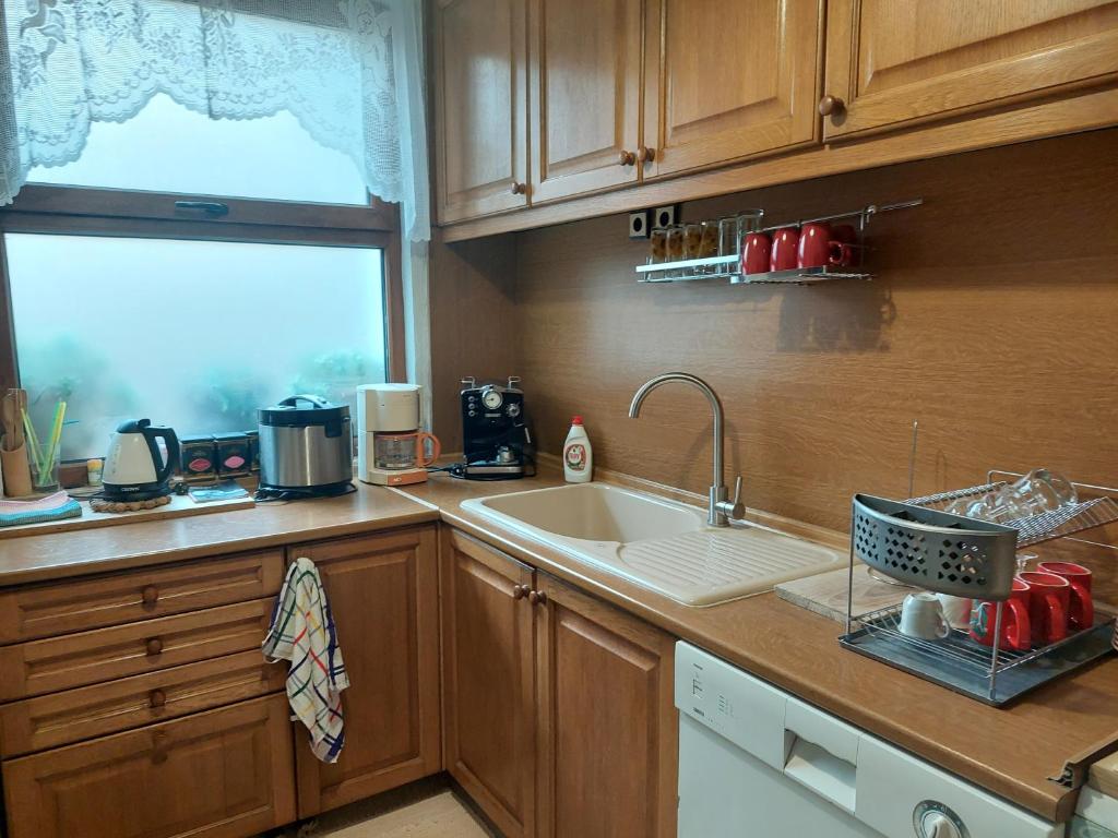 A kitchen or kitchenette at Didi House