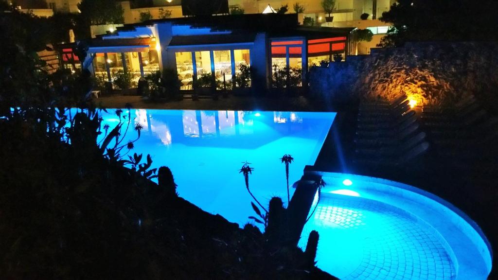 Bazén v ubytování Hotel Club Koiné nebo v jeho okolí