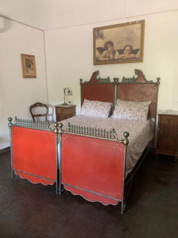 Postel nebo postele na pokoji v ubytování Casa Filù