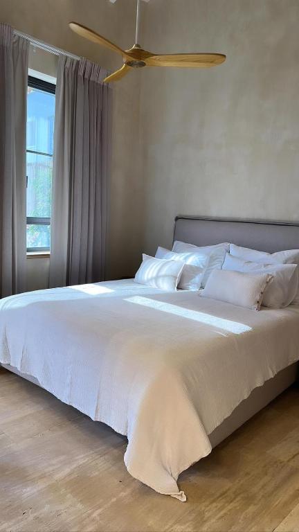 Postel nebo postele na pokoji v ubytování Hagafen Boutique Suites