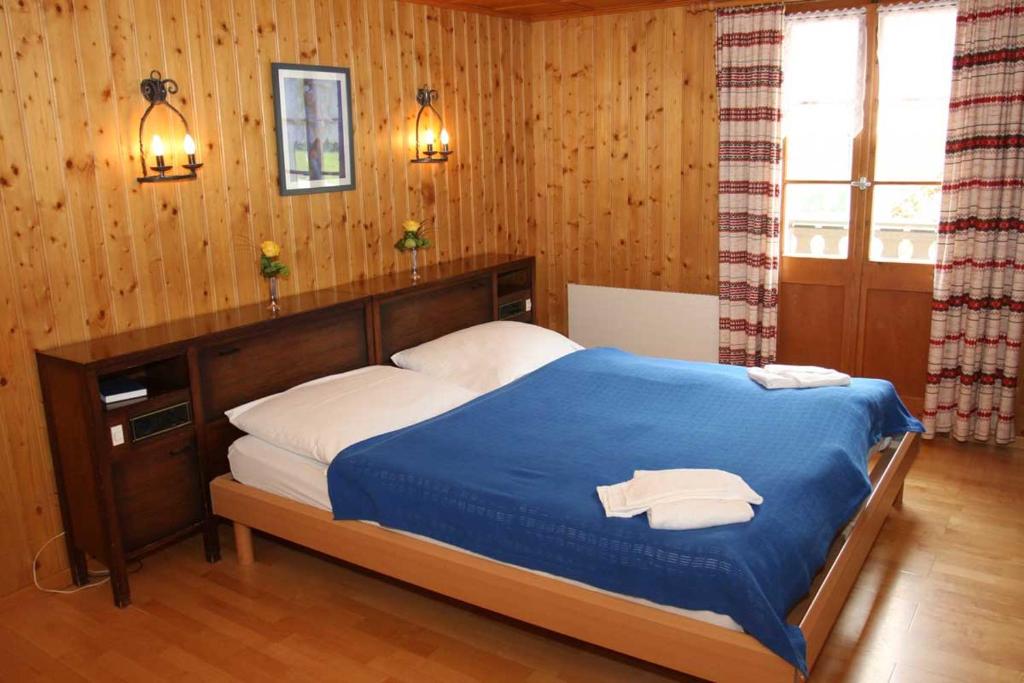 Postel nebo postele na pokoji v ubytování Gasthaus Waldhaus