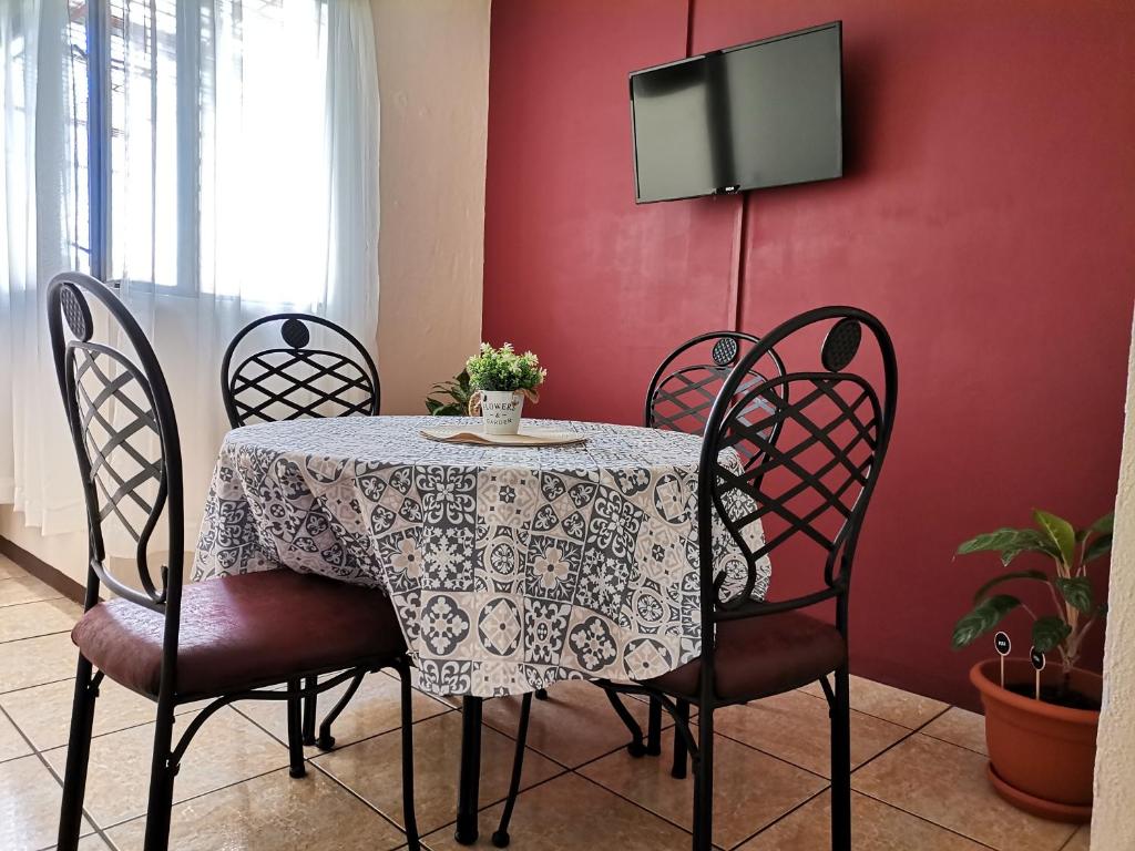 TV a/nebo společenská místnost v ubytování Casa Cafetal Aeropuerto